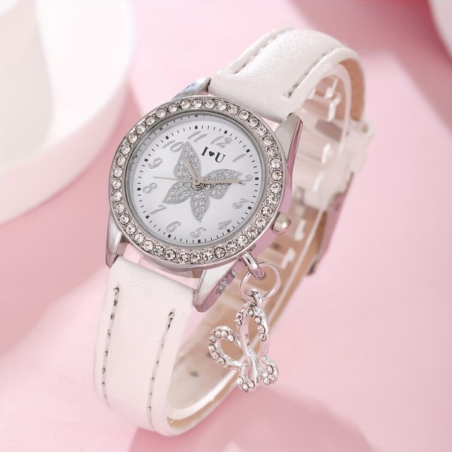 Elegantna bela ura z metuljem 
