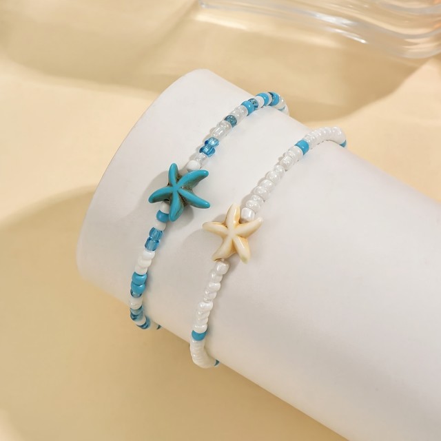 Komplet 2 zapestnic za nogo z morskimi zvezdicami