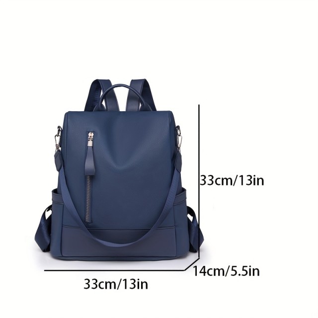 Ženski usnjeni nahrbtnik nastavljiv temno moder 