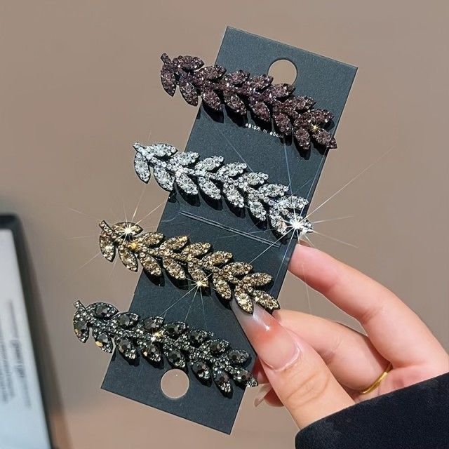 Komplet 4 sponk za lase z elegantnim dizajnom listov