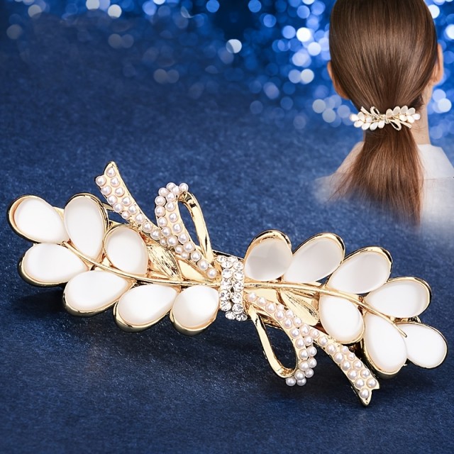Elegantna sponka za lase v belo zlati kombinaciji