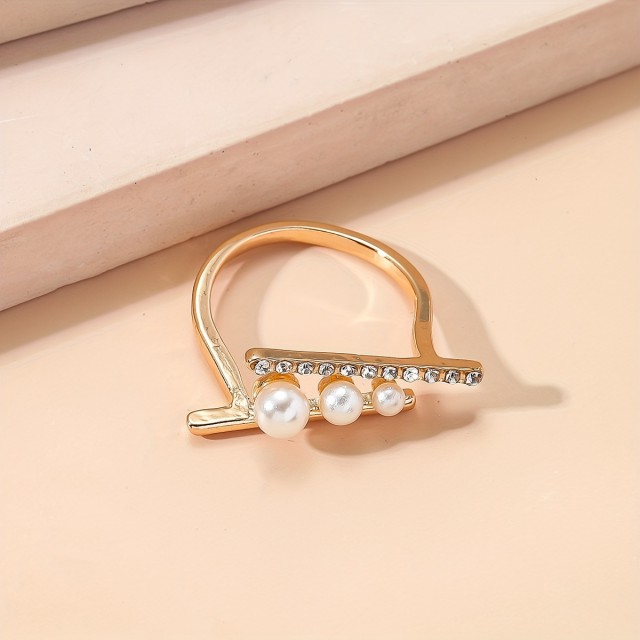 Elegantni nastavljiv odprt prstan z imitacijo perlic