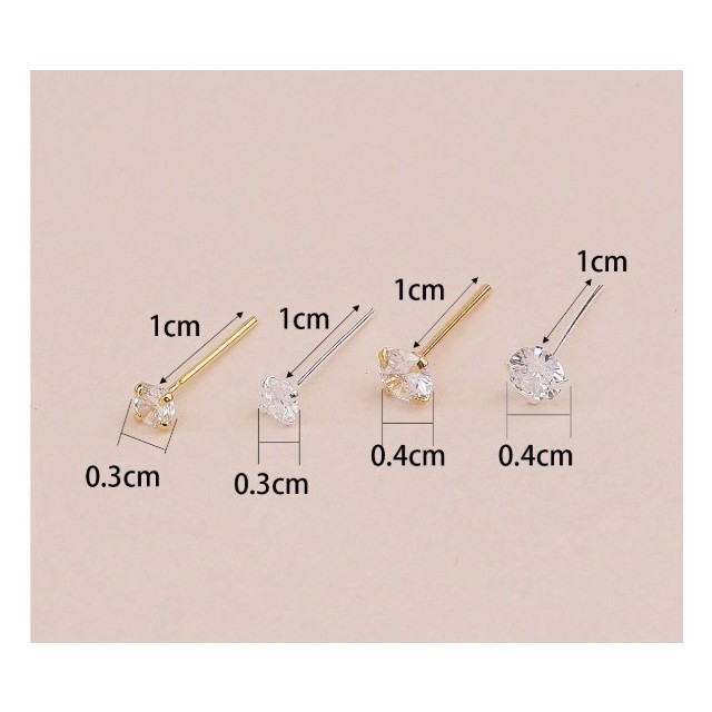 Škatlica z 20 piercingi za nos srebrne barve