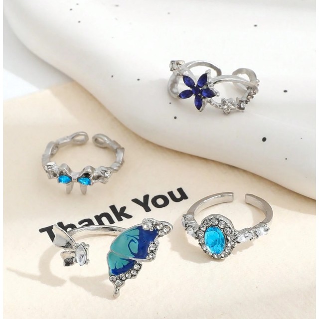 Komplet 4 odprtih modrih prstanov 