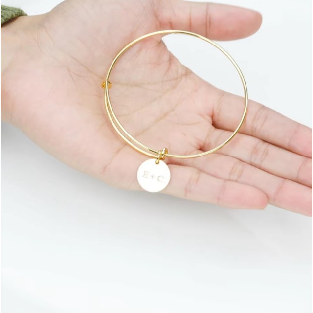 Personalizirana zapestnica z okroglimi obeski in gravuro po želji