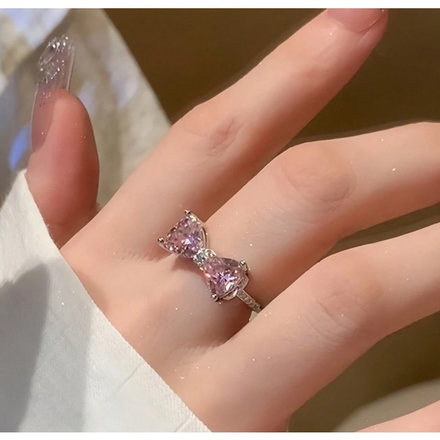 Nastavljiv odprt prstan z roza pentljico