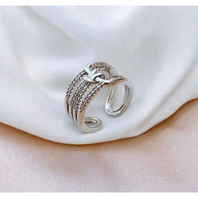 Eleganten nastavljiv prstan v zlati barvi s cirkoni - 2 barvi