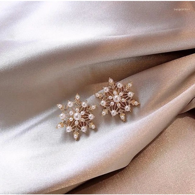 Elegantni uhani snežinke zlate barve