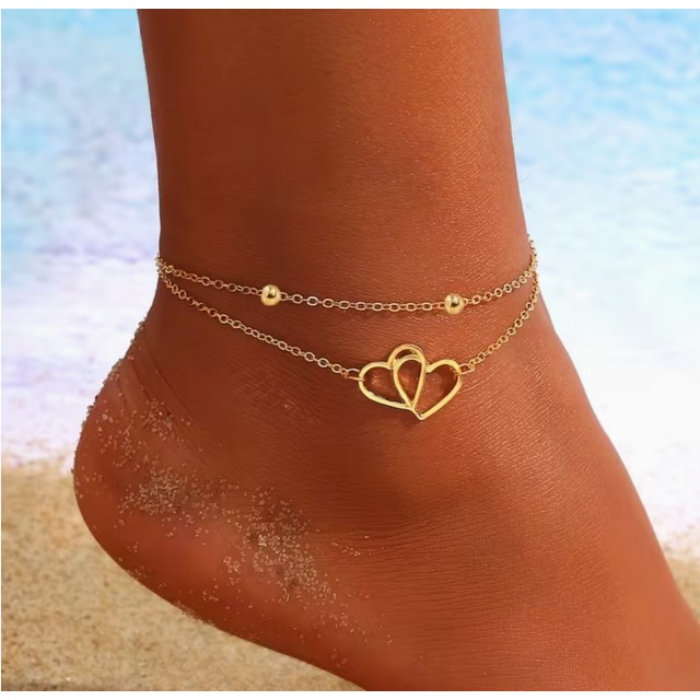 Dvojna zlata zapestnica za nogo s srcem