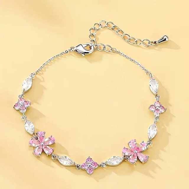 Elegantna zapestnica z rožami v roza barvi