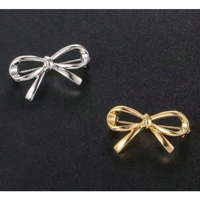 Komplet 2 brošk v obliki pentlje zlata in srebrna 