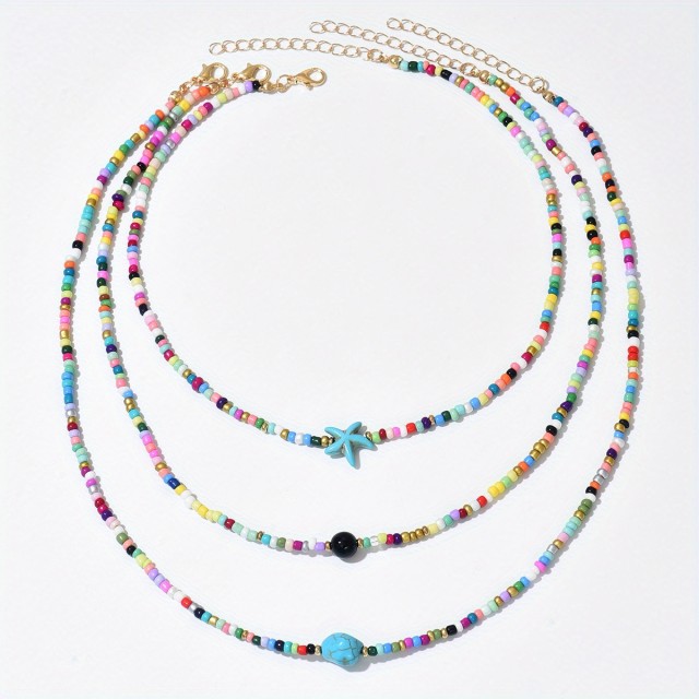 Komplet 3 poletnih ogrlic s pisanimi perlicami