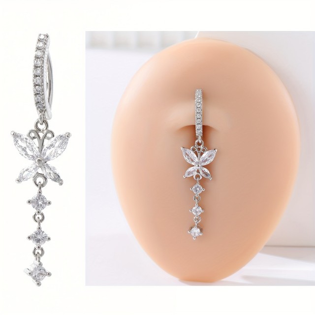 Piercing z metuljčkom in visečimi kamenčki