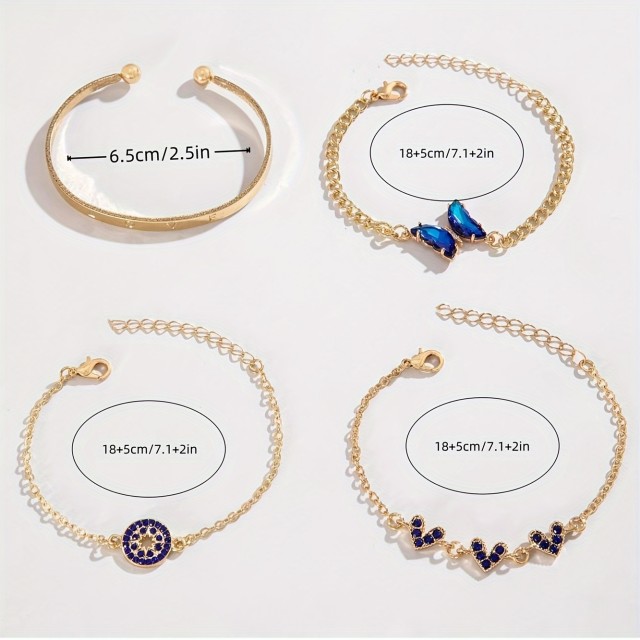 4 delni komplet zapestnic v zlatih odtenkih z modrimi dragulji 