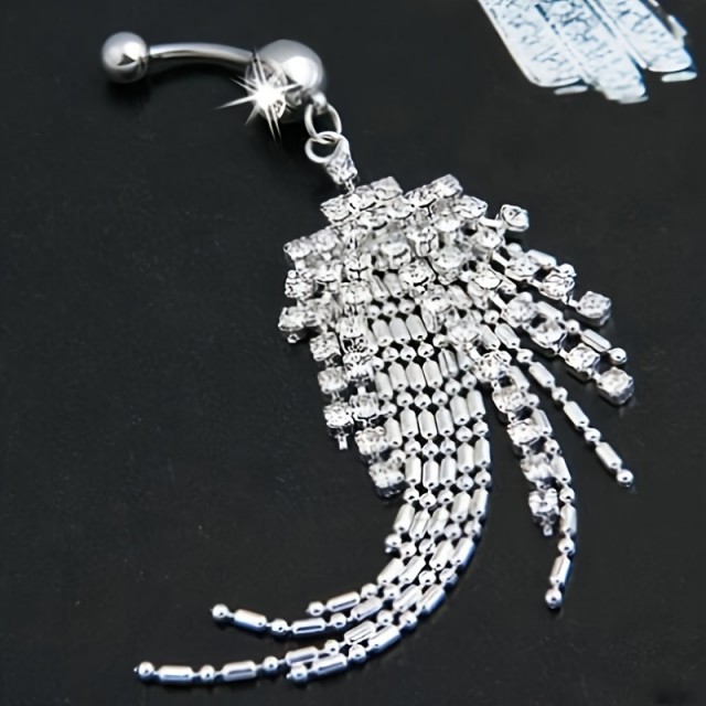 Piercing za popek s srebrnimi resicami 