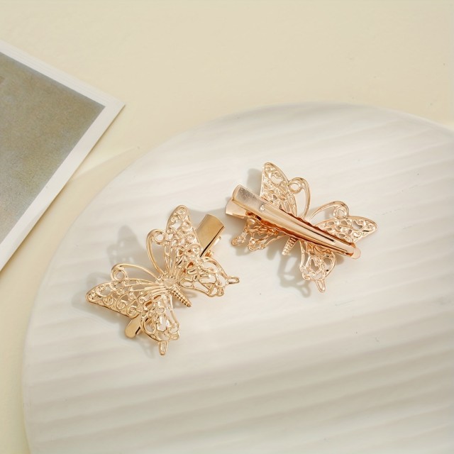 4 kosi srčkanih sponk za lase z zlatim metuljčkom