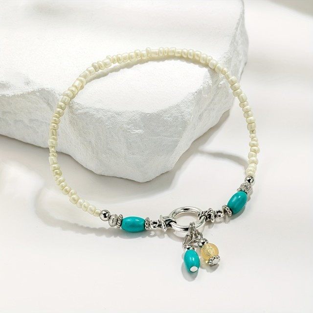 Zapestnica za nogo z visečimi pisanimi perlami