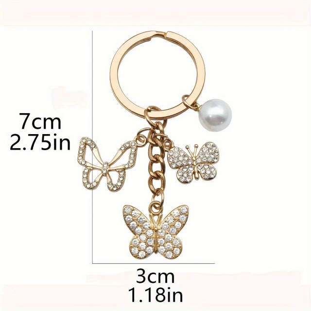 Obesek za ključe s 3 metuljčki zlate barve
