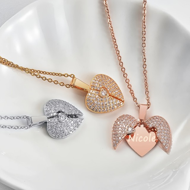 Personalizirana ogrlica z odpirajočim srcem in gravuro po vaših željah