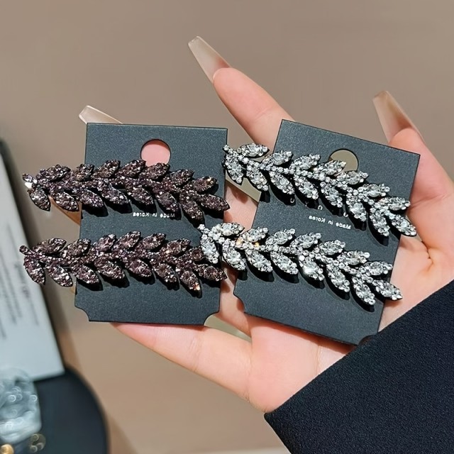 Komplet 4 sponk za lase z elegantnim dizajnom listov