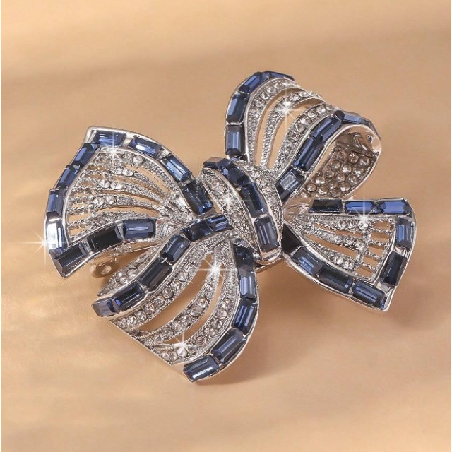 Broška v obliki pentlje v modri barvi 