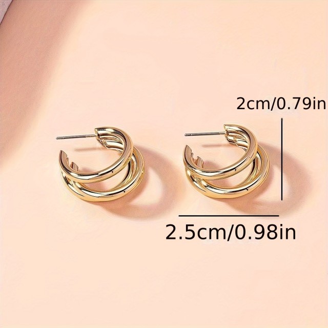 Elegantni triplastni uhani v zlati barvi