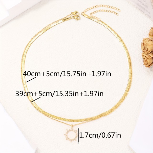 Dvojna elegantna ogrlica v zlati barvi sonce