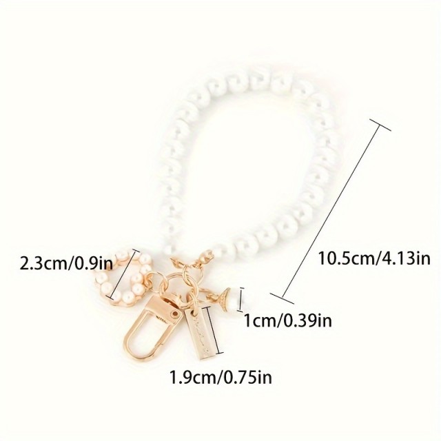 Eleganten obesek za ključe z belimi perlicami