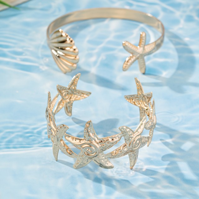 Komplet 2 zlatih nastavljivih zapestnic z morskim motivom