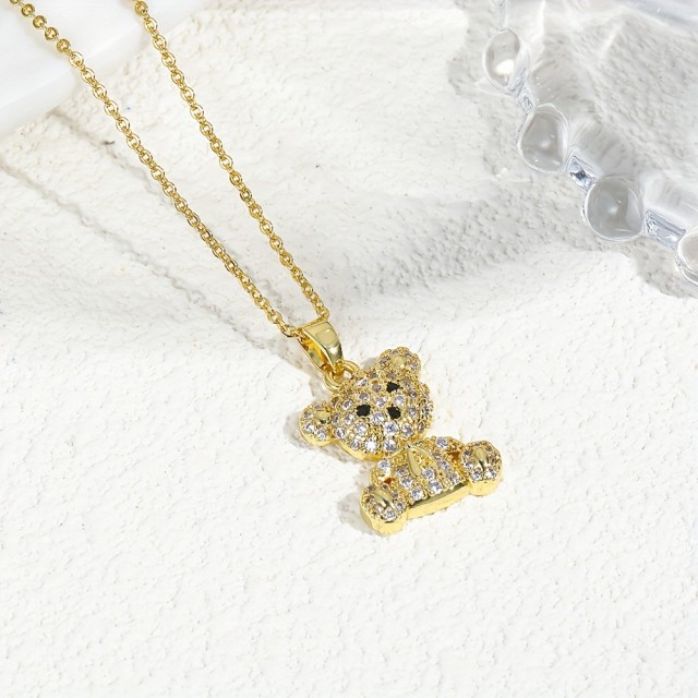 Prikupna ogrlica z medvedkom zlate barve 
