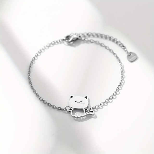 Prikupna zapestnica v srebrni ali zlati barvi z muco