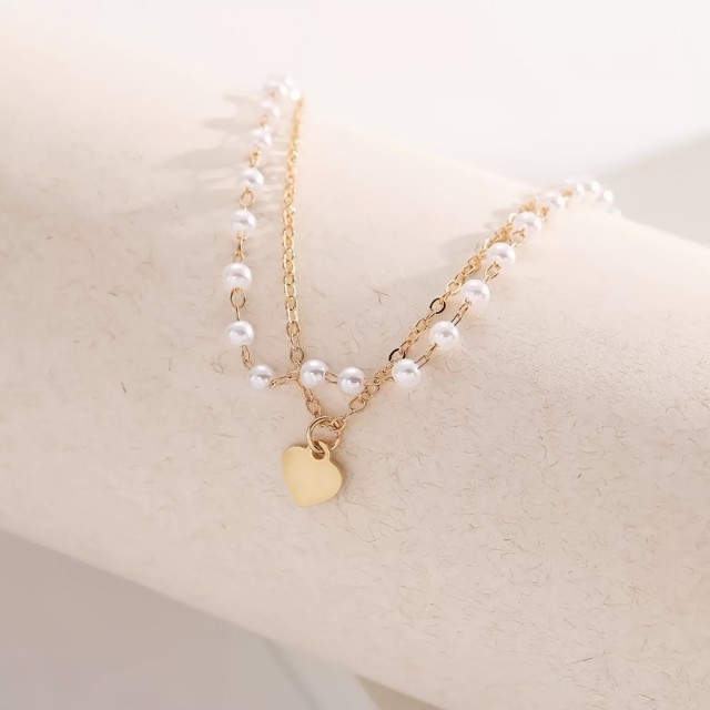 Personalizirana zapestnica s perlicami in obeskom srca 