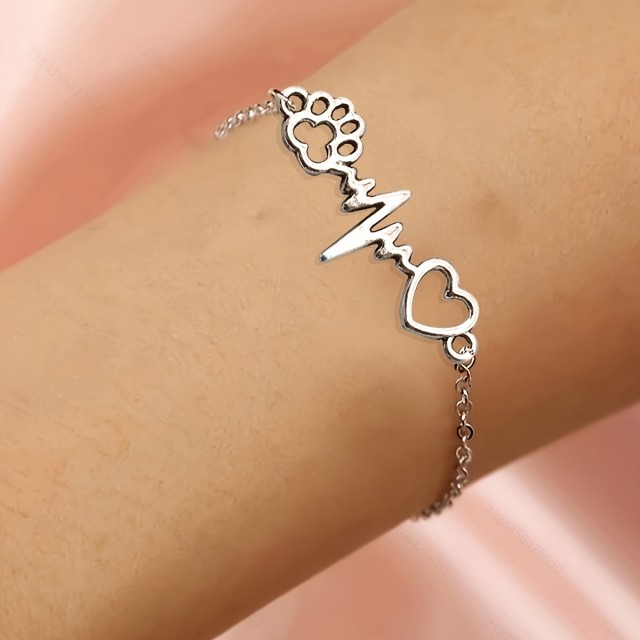 Prikupna zapestnica s tačko in srčnim utripom