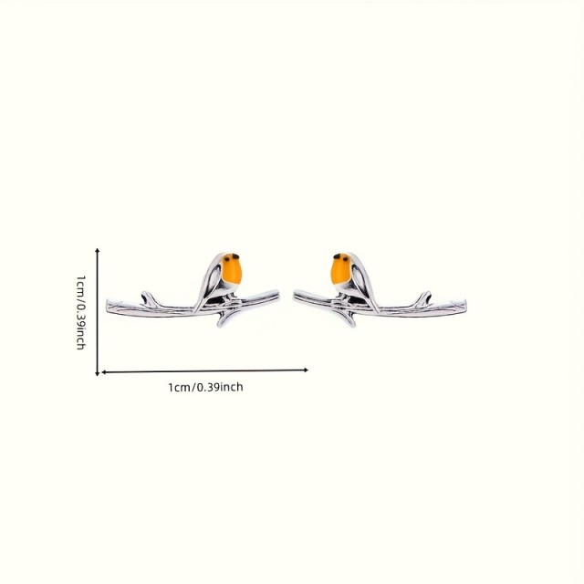 Prikupni uhani s ptičko na veji