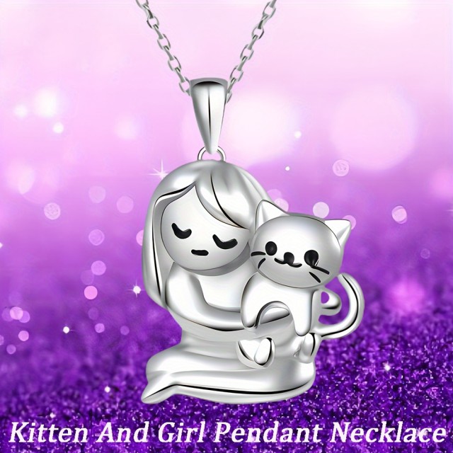 Očarljiva ogrlica z obeskom deklice ki drži mucka