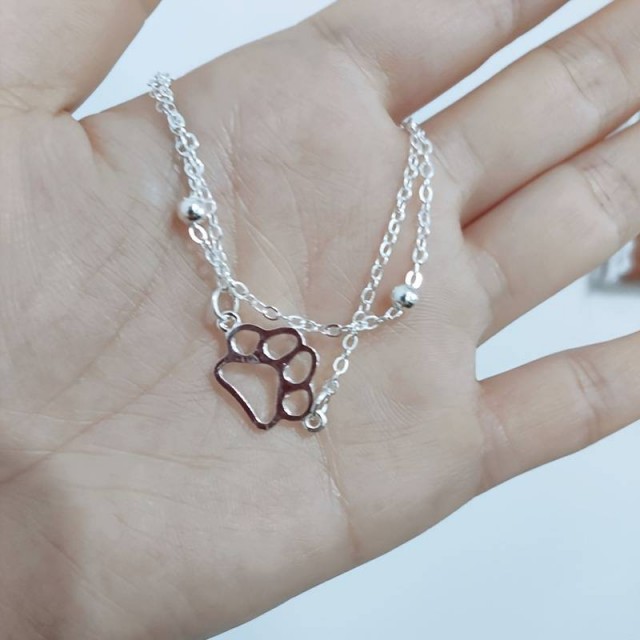 Dvodelna zapestnica s tačko v srebrni barvi