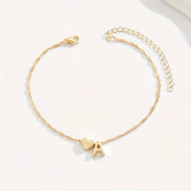 Nastavljiva zlata zapestnica za nogo z inicialko