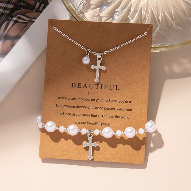 Komplet zapestnice in ogrlice s perlicami in križem