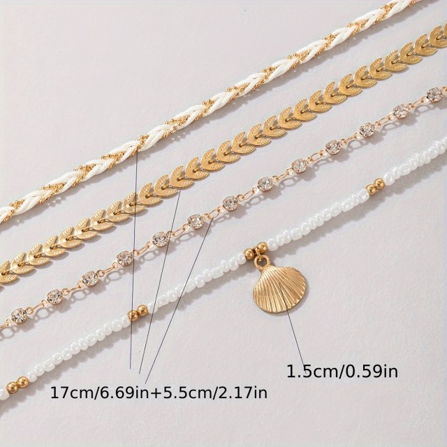 4-delni komplet zapestnic v temno modri barvi s školjko