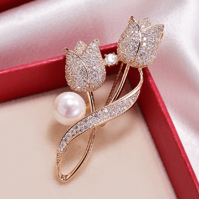 Elegantna broška s tulipanom srebrne barve