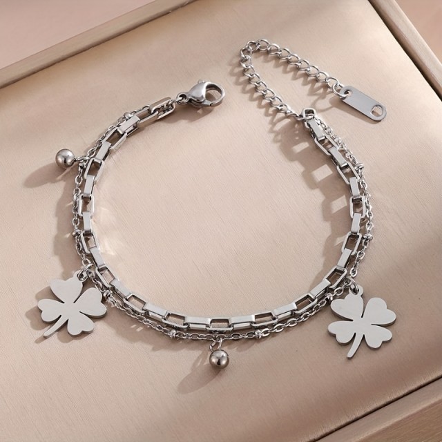 Elegantna zapestnica iz nerjavečega jekla z deteljicami