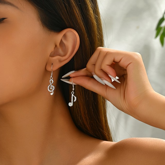 Viseči uhani z noto srebrne barve