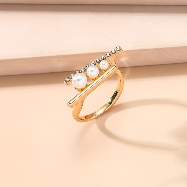 Elegantni nastavljiv odprt prstan z imitacijo perlic