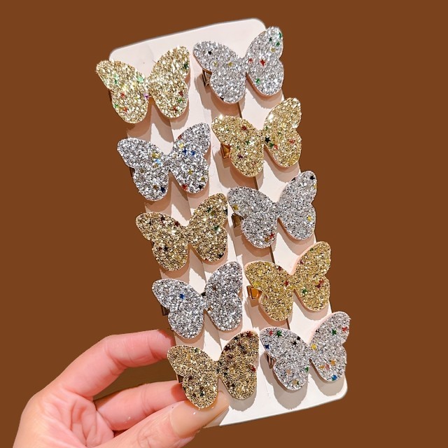 Komplet 10 zlatih in srebrnih metuljčkastih lasnic 