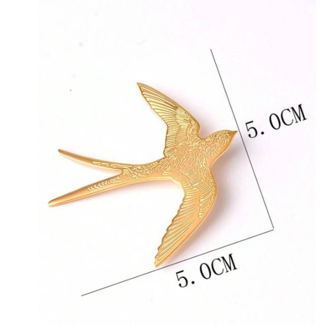 Zlata broška v obliki lastovke 