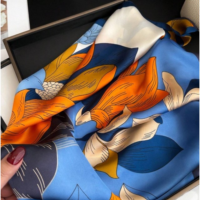 Elegantna ženska ruta v modro oranžni barvi 