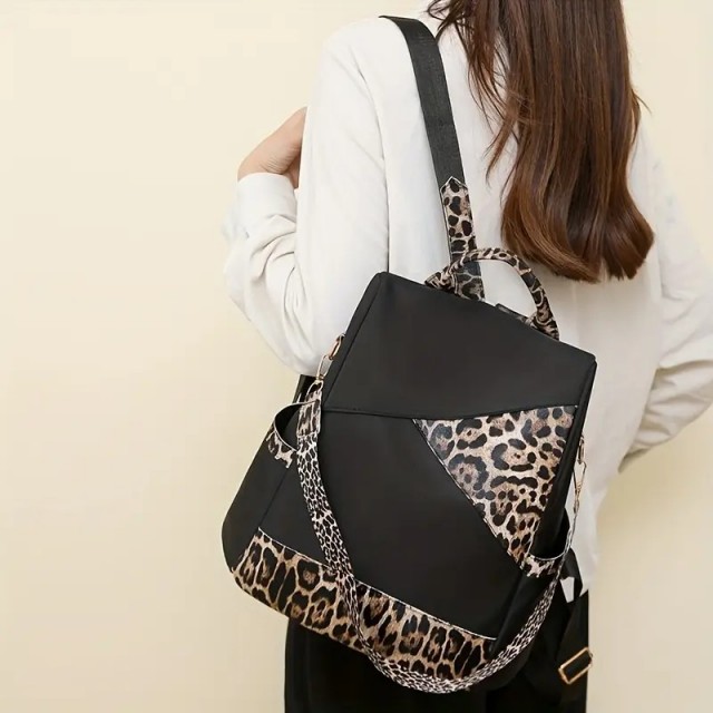 Ženski elegantni nahrbtnik tigrast vzorec