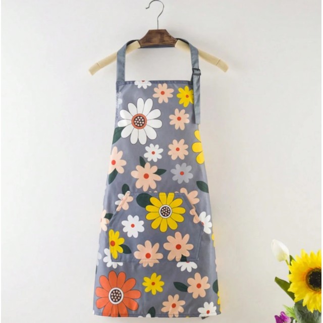 Vodoodporen ženski predpasnik z večjim žepom in potiskom rožic