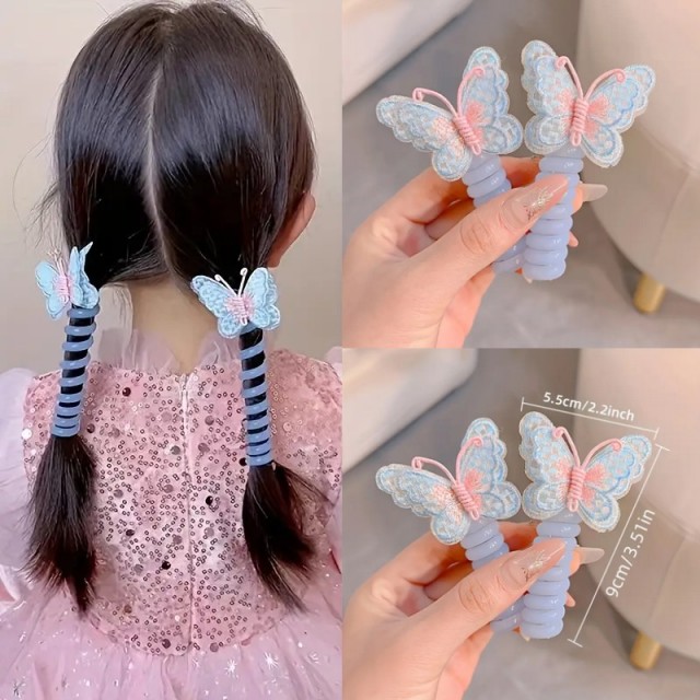 Komplet 2 spiralnih lasnih sponkic z modrimi metulji