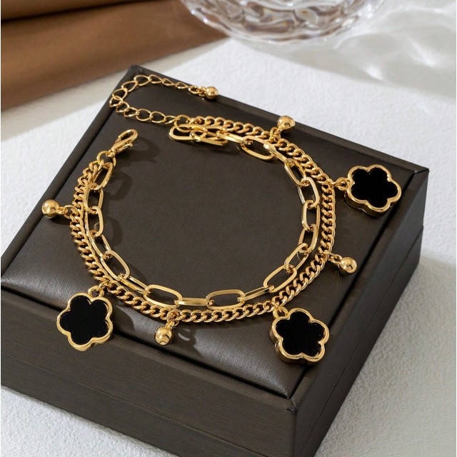 Zapestnica za nogo s črnimi cvetovi